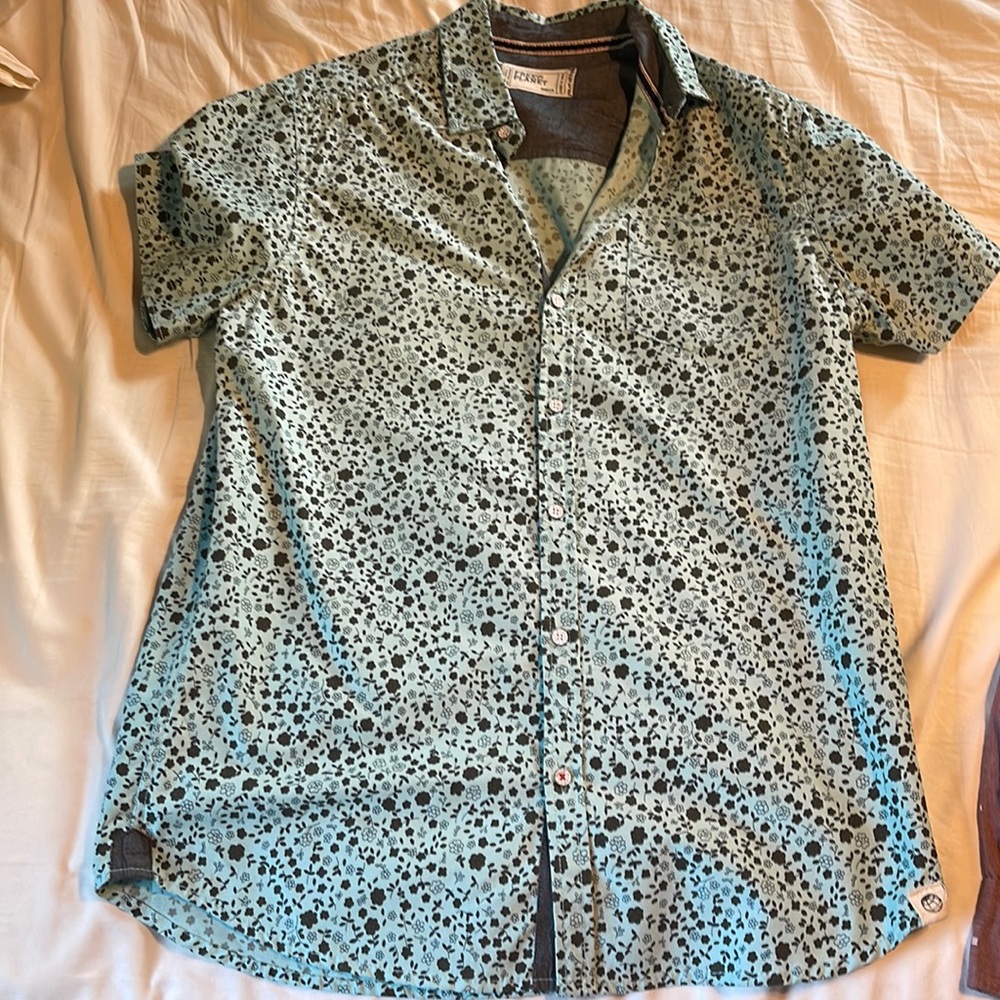 Light bluish green free planet dress shirt. Size small.